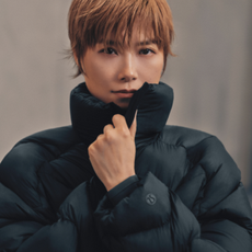 Woman wearing puffy jacket.