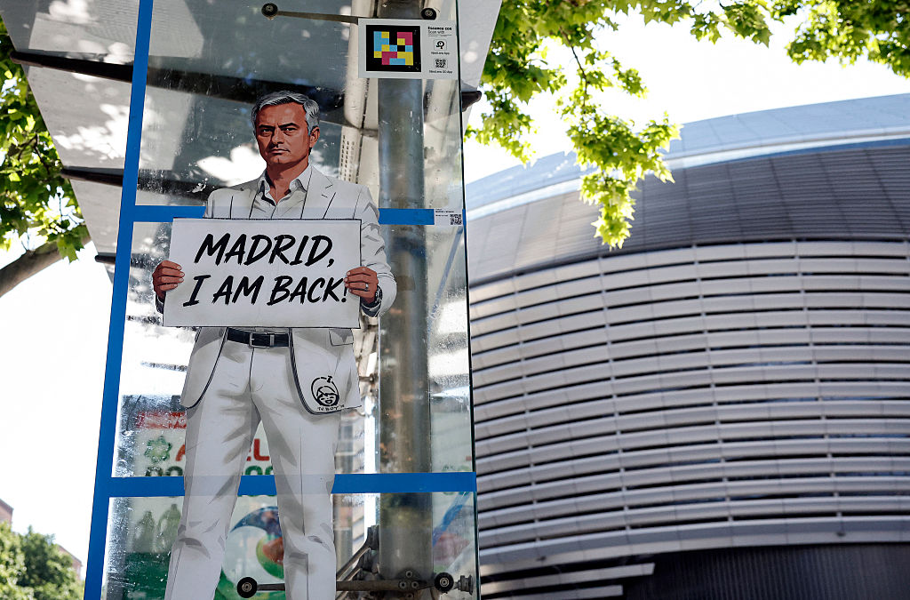 A mural by Italian urban artist Salvatore Benintende aka "TV BOY" depicting Portuguese coach Jose Mourinho is seen in front of the Santiago Bernabeu stadium in Madrid