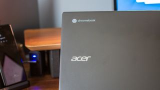 Acer Chromebook Spin 513 (2022) outer Acer and Chromebook logos