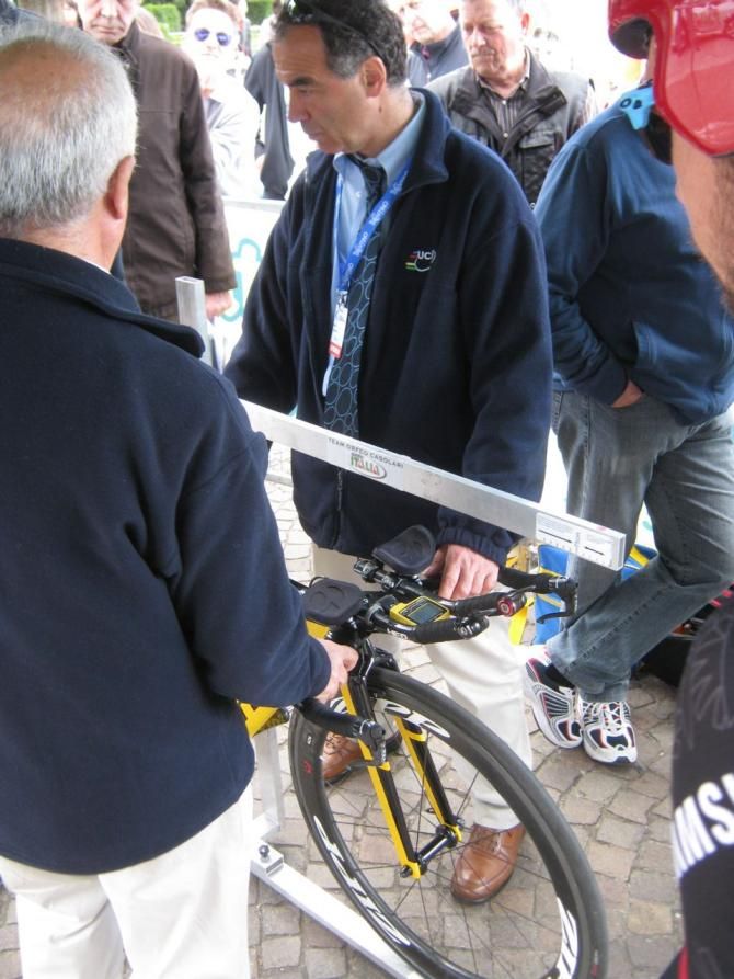 The UCI commissaries checked every bike before the riders studied the course