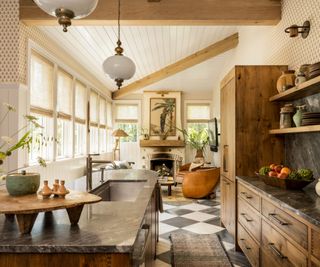Rustic kitchen leading into a living room