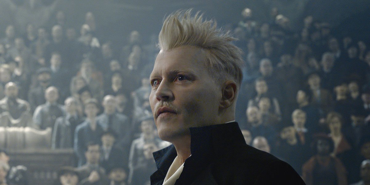 Gellert Grindelwald (Johnny Depp) stands before a crowd in &quot;Fantastic Beasts and Where To Find Them: The Crimes of Grindelwald&#039;