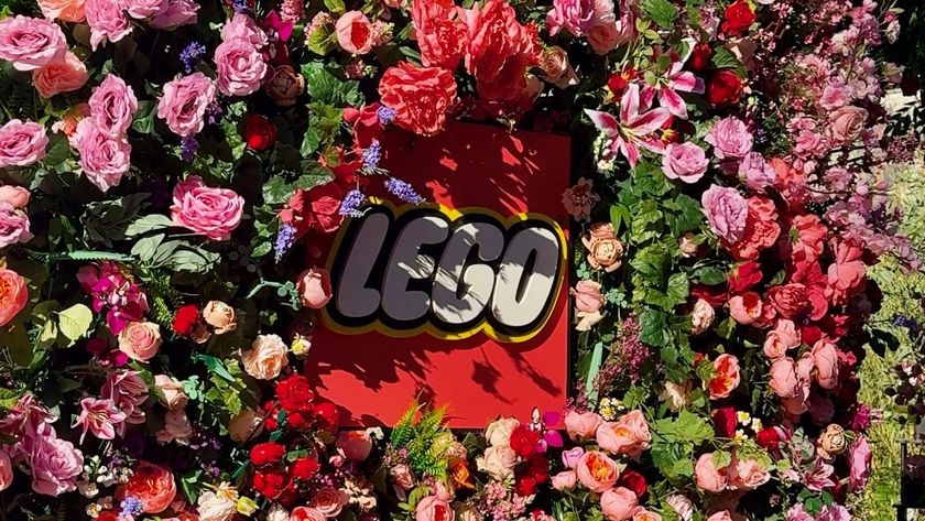 A close-up of the Lego logo at a Botanical Garden pop up