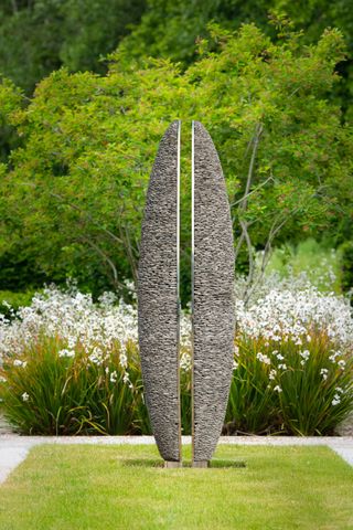 Bespoke sculpture used as a focal point for large garden ideas