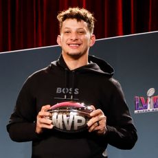 Quarterback Patrick Mahomes #15 of the Kansas City Chiefs pose after being presented the Pete Rozelle Trophy as Super Bowl LVIII Most Valuable Players.
