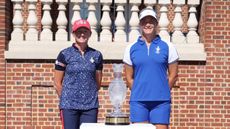 Stacy Lewis and Suzann Pettersen stand with the Solheim Cup