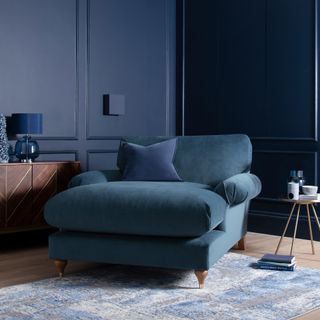 Blue cuddle chaise in blue room