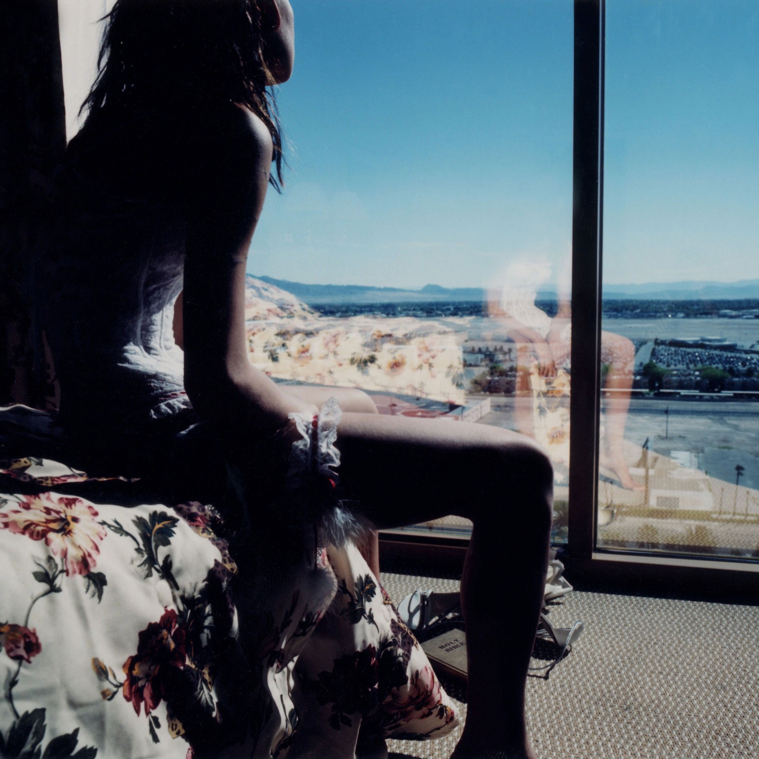 Woman staring at view outside window