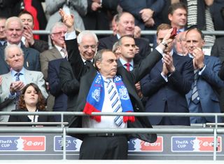 Portsmouth manager Avram Grant acknowledges the fans after collecting his runners up medal at the FA Cup final