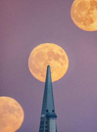 The moon rises over the Transamerica Pyramid in San Francisco, California, on Sept. 23, 2018, one day before the Harvest Moon reached full phase.