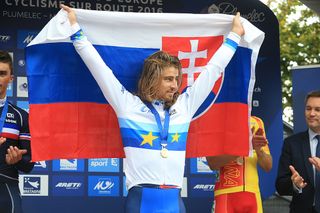 Peter Sagan holds the Slovakian flag aloft following his win in the European championships