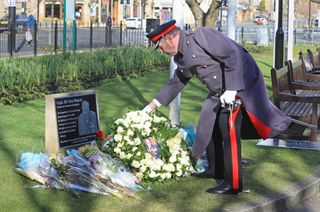 David Pearson, Deputy Lieutenant for West Yorkshire lays a wreath of 200 white roses at the Sir Tom Moore memorial plaque in Keighley, West Yorkshire, on the day of Captain Sir Tom Moore's funeral.