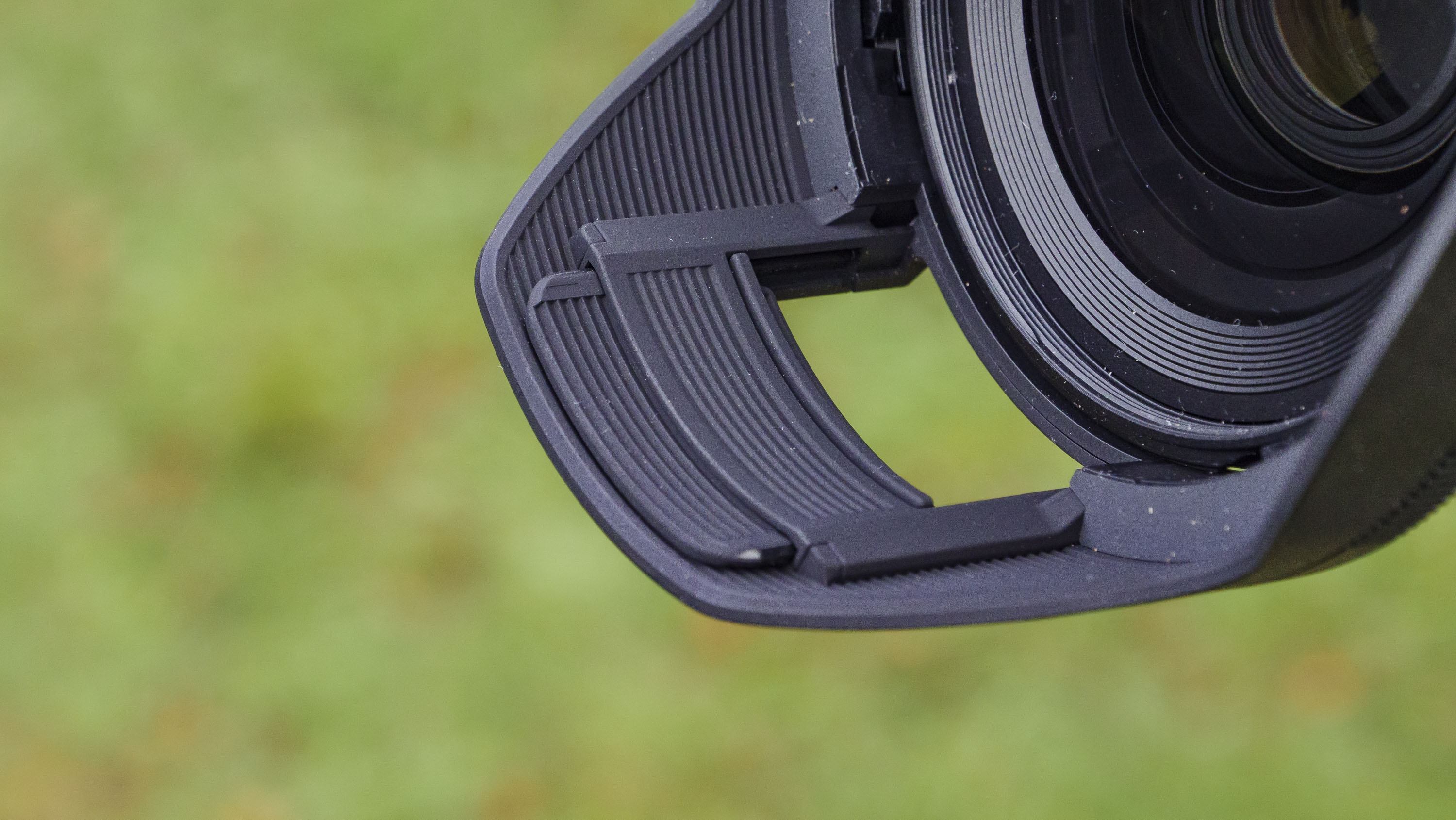 Closeup of the Nikon Z 24-70mm f/2.8 S II lens hood with filter hatch open