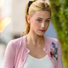 Lili Reinhart started her 'Love Hypothesis' press tour in the perfect pink cardigan for fall
