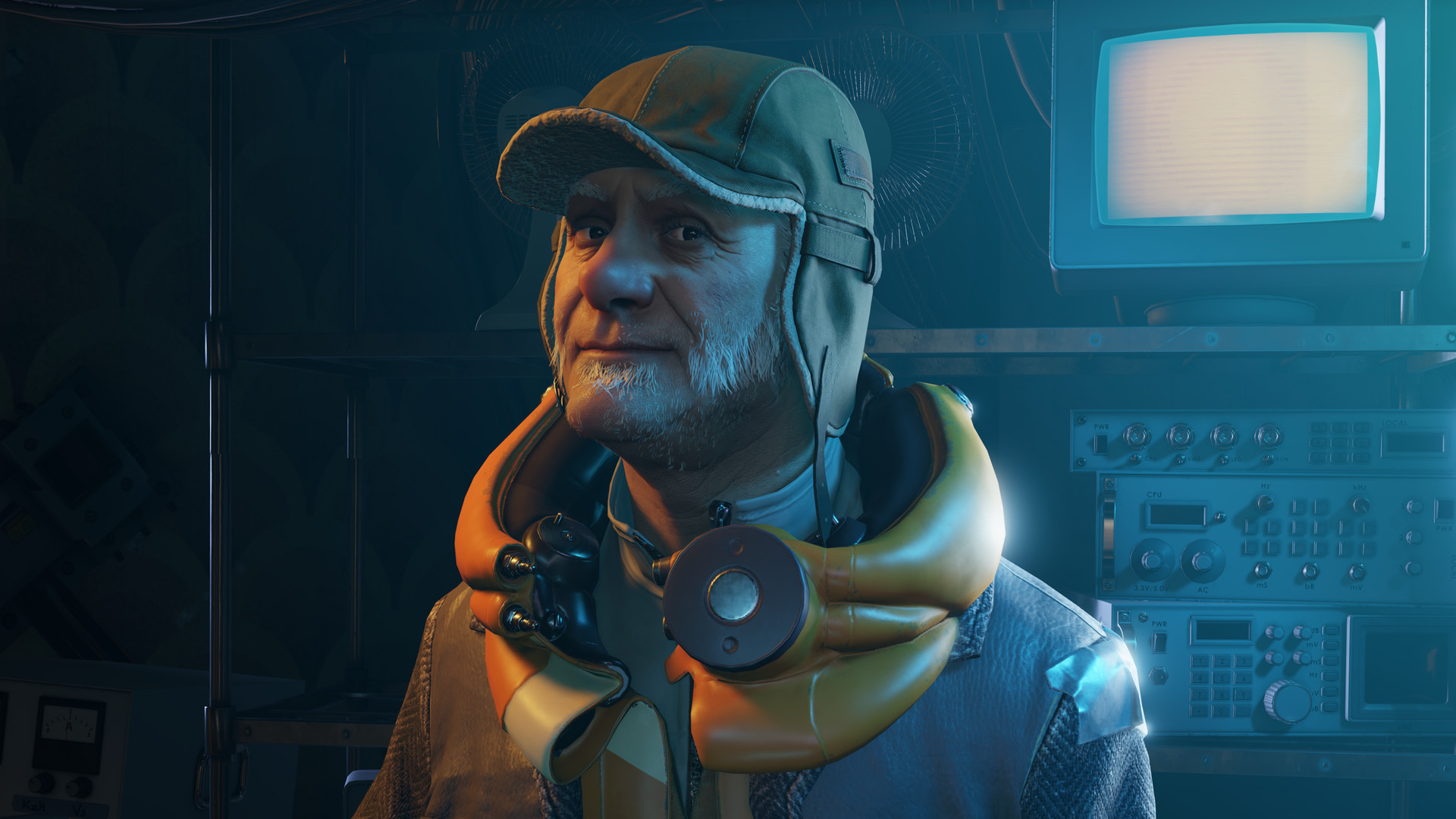 An older bearded man in a cap stood in front of computer equipment in Half-Life Alyx