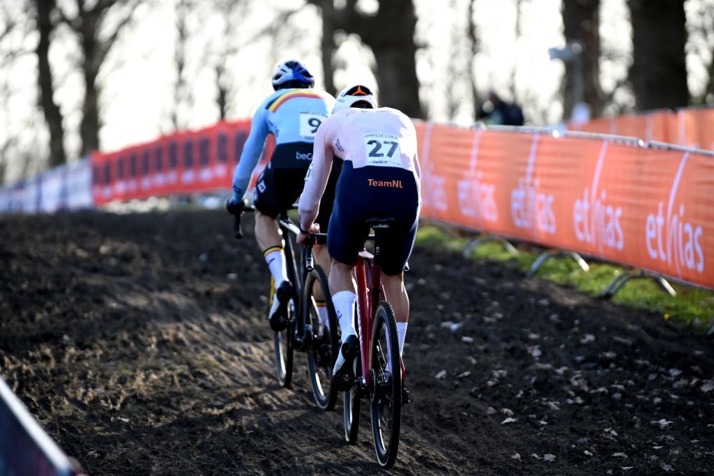HOOGERHEIDE NETHERLANDS FEBRUARY 05 A general view of Wout Van Aert of Belgium and Mathieu Van Der Poel of The Netherlands compete during the 74th World Championships CycloCross 2023 Mens Elite CXWorldCup Hoogerheide2023 on February 05 2023 in Hoogerheide Netherlands Photo by David StockmanGetty Images