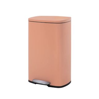 A pink stainless steel trash can
