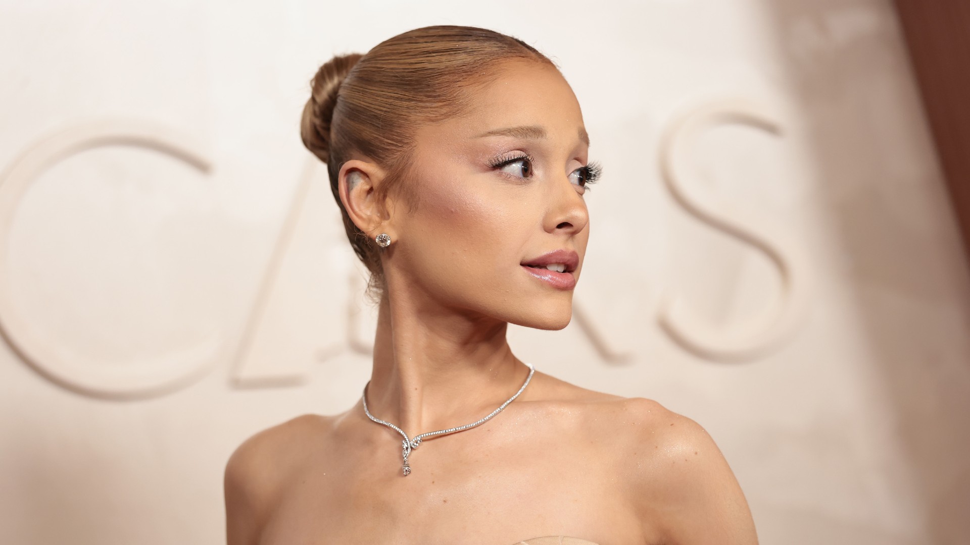 ariana grande on the red carpet with blonde hair