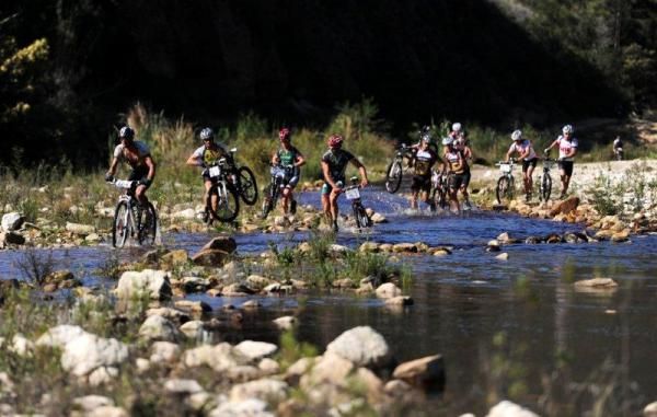 Racers negotiate another water crossing