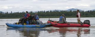 The dinobarge in action: heading down the Yukon River.