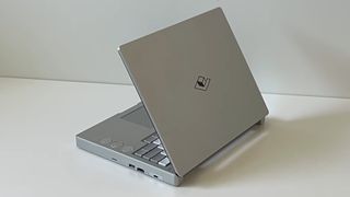 A "mechanical laptop" built around a Framework design, with rotary encoders sunk into the top