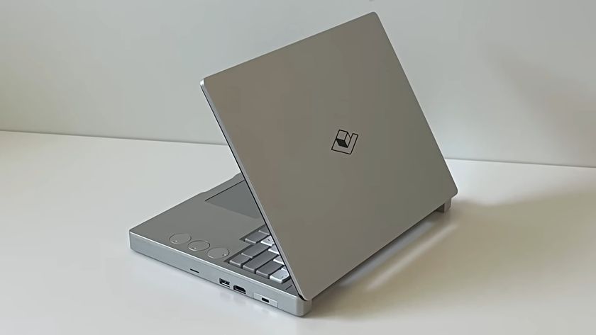 A &quot;mechanical laptop&quot; built around a Framework design, with rotary encoders sunk into the top