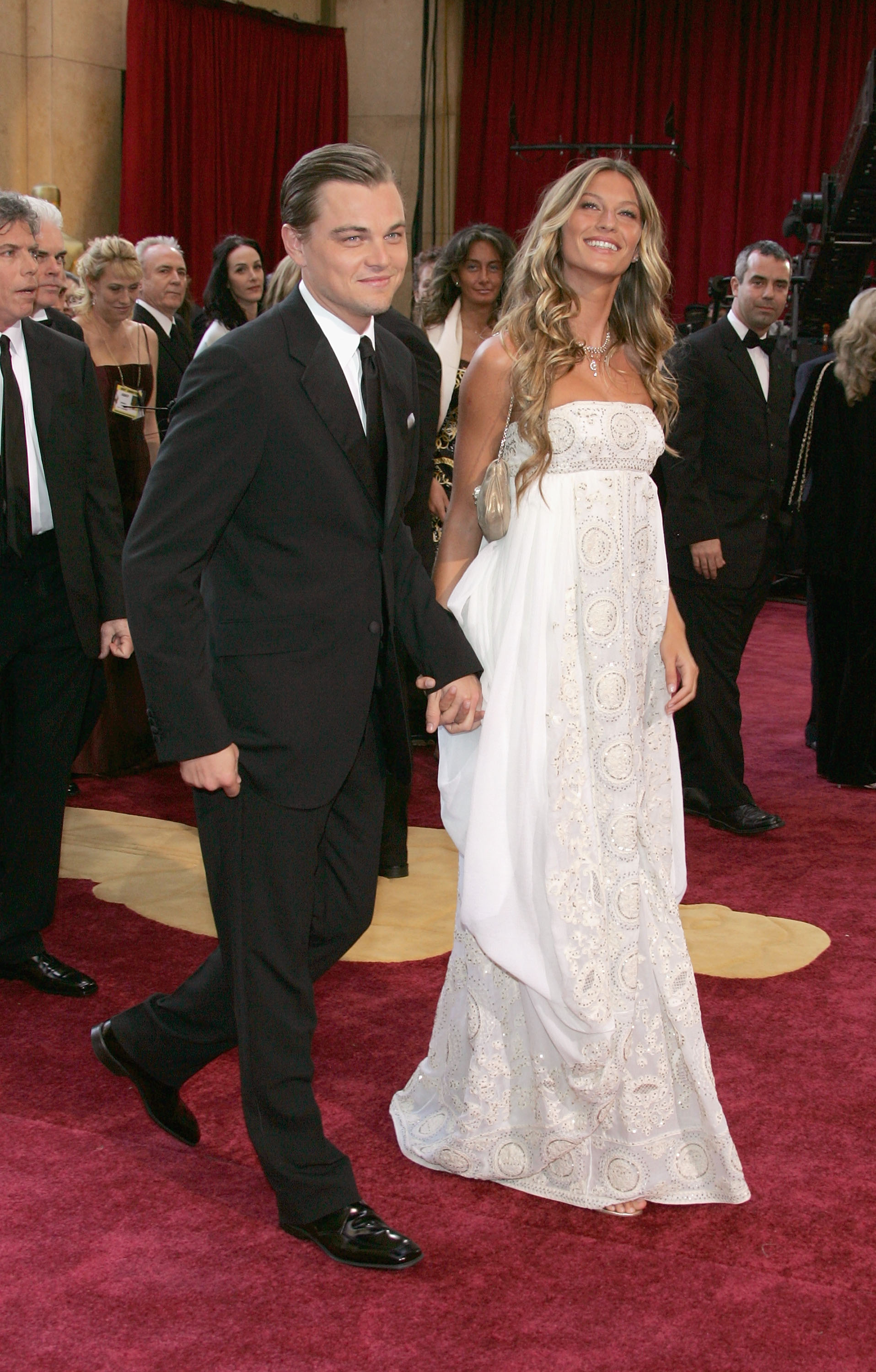 Leonardo DiCaprio, nominated for Best Actor for his role in "The Aviator," arrives with girlfriend Brazilian model Gisele Bundchen at the 77th Annual Academy Awards at the Kodak Theater on February 27, 2005 in Hollywood, California. (Photo by Vince Bucci/Getty Images)