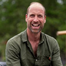 Prince William in a green shirt