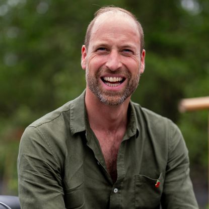 Prince William in a green shirt