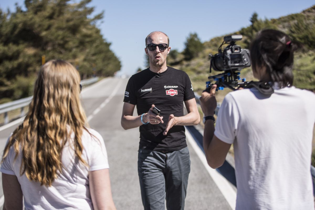 Trainer Adriaan Helmantel is interviewed out on the road