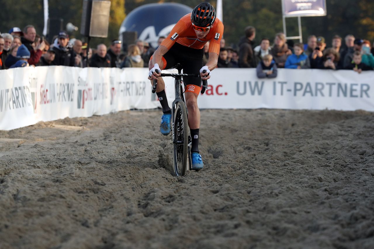 Mathieu van der Poel rides through the sand