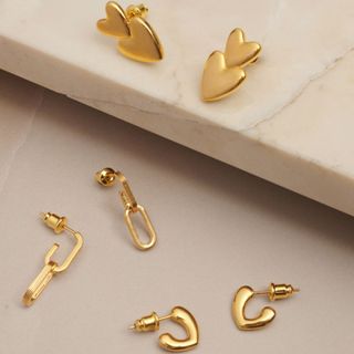 katie loxton earrings on marble counter