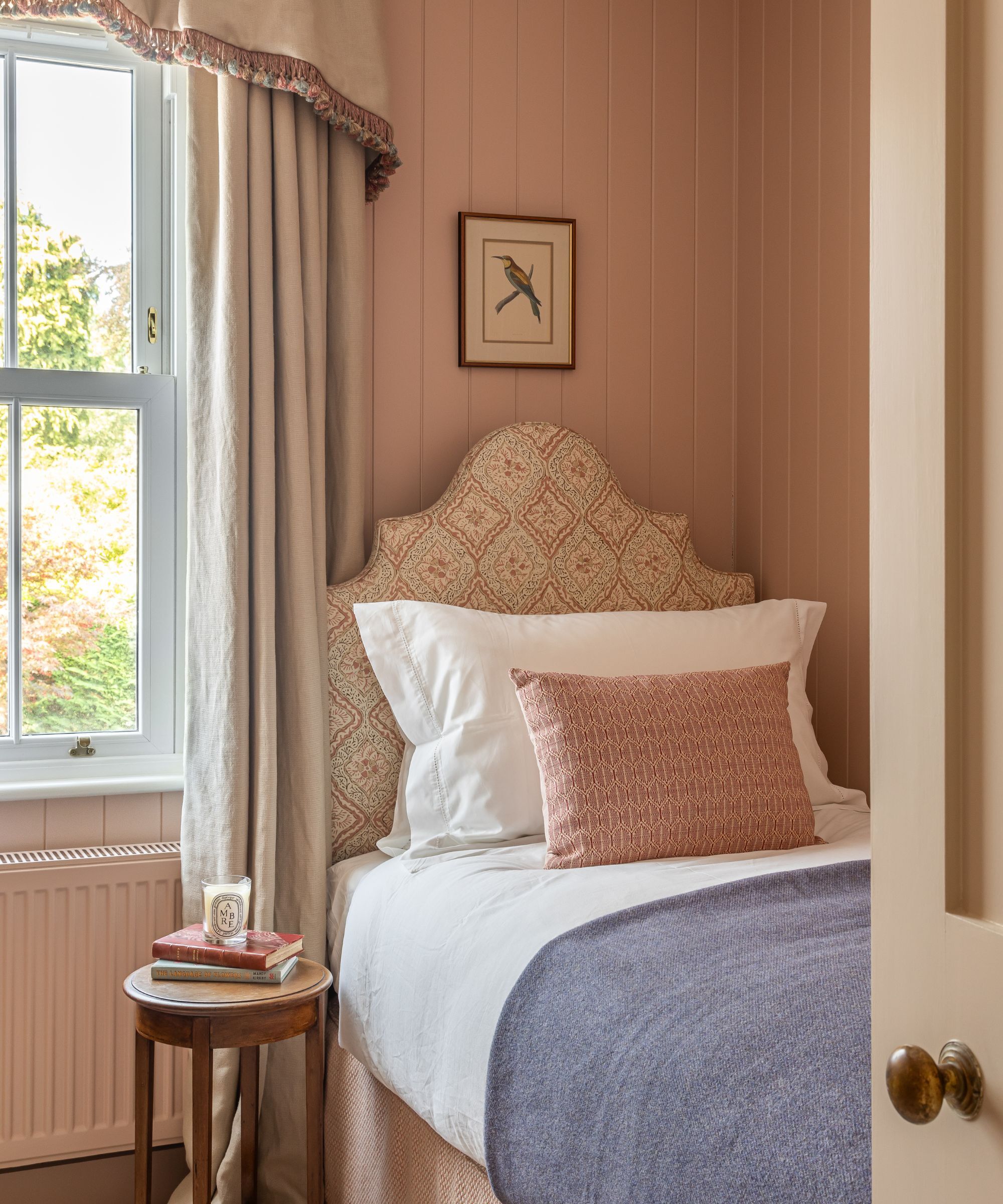 A pink single bedroom