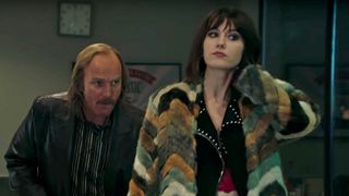 A still from the TV show Fargo in which two characters, including Mary Elizabeth Winstead, are standing in a room.
