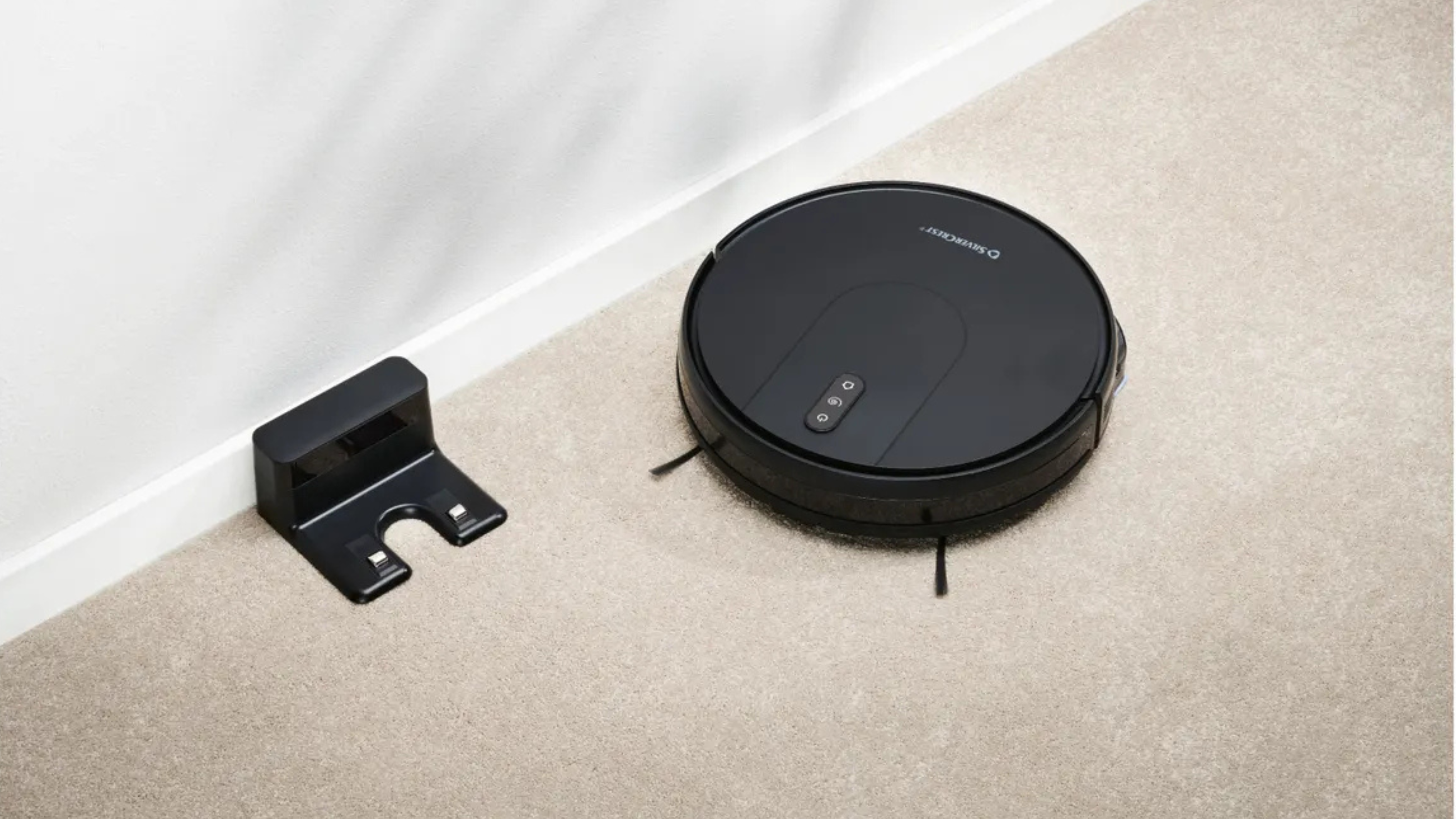 Silvercrest Robot Vacuum Cleaner With Mop Function on cream carpet