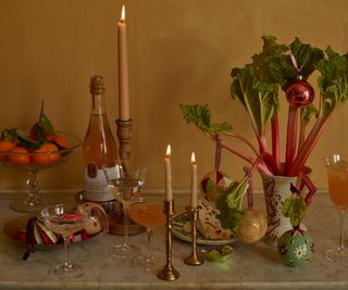 rowen & wren advertorial - display of christmas vases baubles and candles