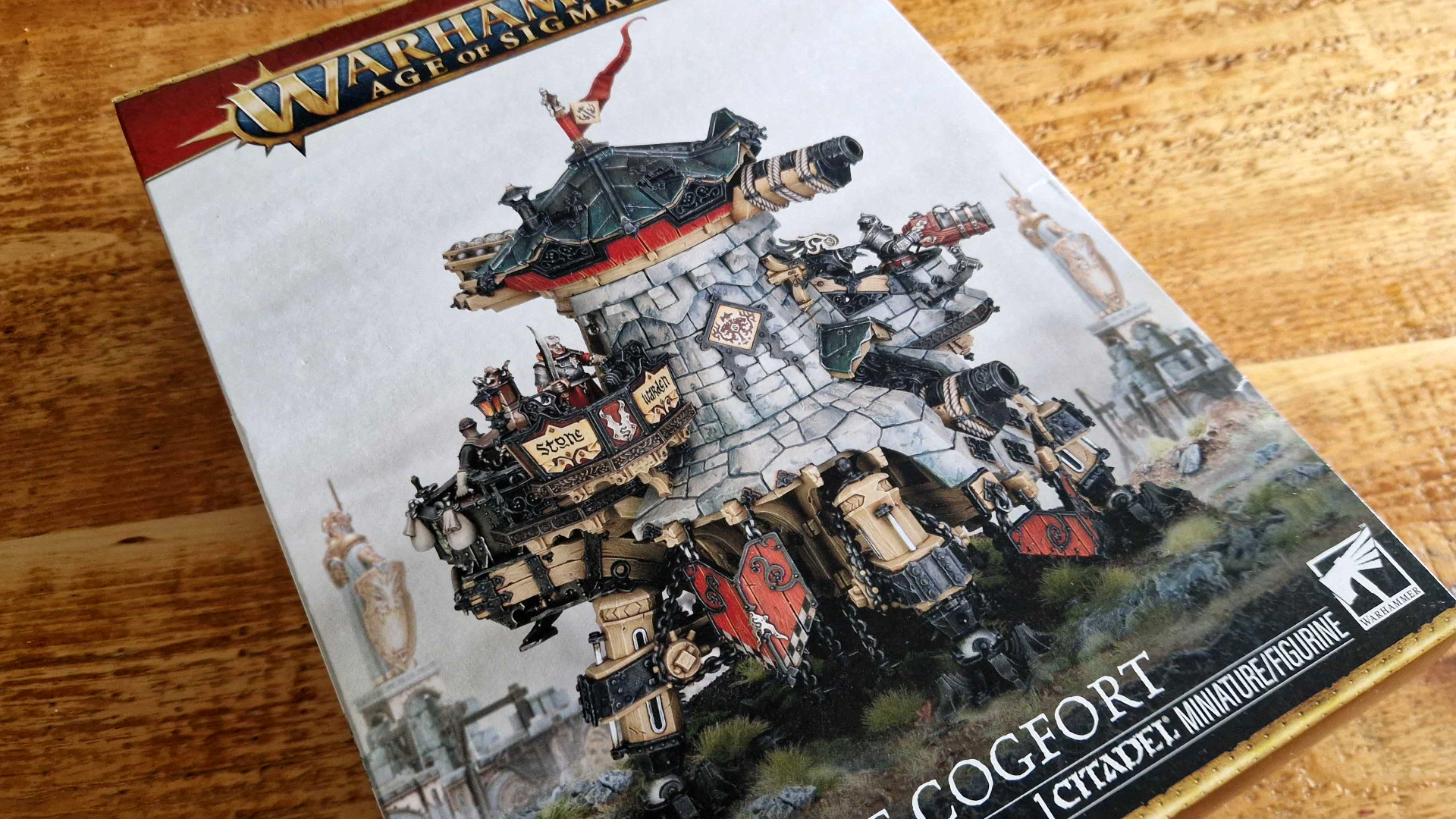 Cities of Sigmar Cogfort box on a wooden surface