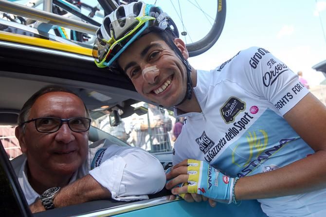 Fabio Aru celebrates with team manager Giuseppe Martinelli