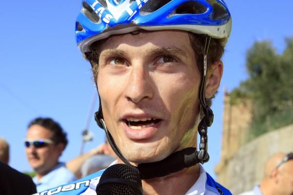 Enrico Battalgin (Colnago CSF-Inox) is interviewed after the finish.