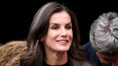 Queen Letizia's latest appearance included the chicest trench coat and streaks of grey hair 