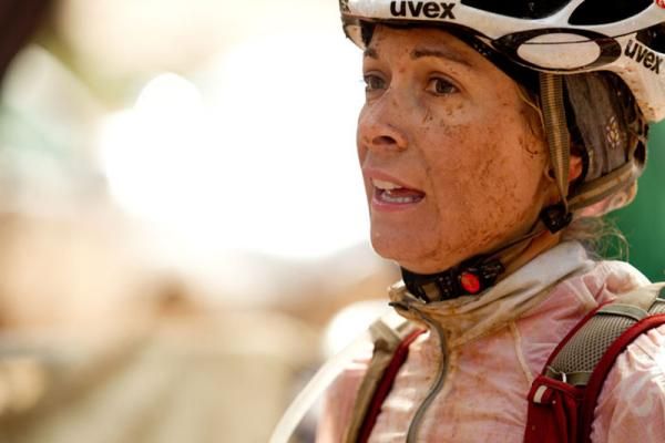 An exhausted yet positive Vanessa Haywood during stage 5 of the 2012 Absa Cape Epic Mountain Bike stage race from the Overberg Primary &amp; High School in Caledon to Oak Valley Wine Estate in the Elgin Valley, South Africa on the 30 March 2012