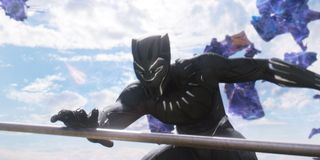 Black Panther grabbing a spear in battle in Black Panther