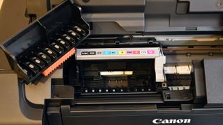 Canon imagePROGRAF PRO-300 Wireless Inkjet Printer being tested in writer's home