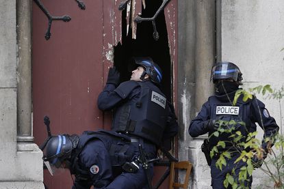 France's big police raid in St. Denis is over, the French government says