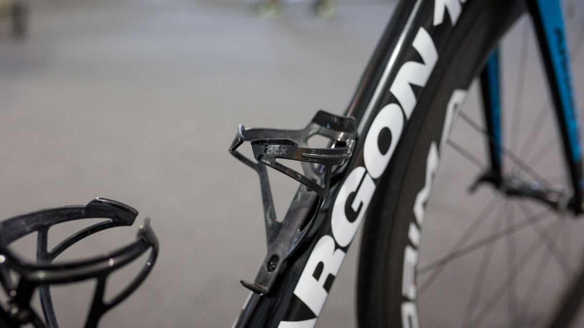 Subtle, black Tacx Deva bottle cages for the Astana team