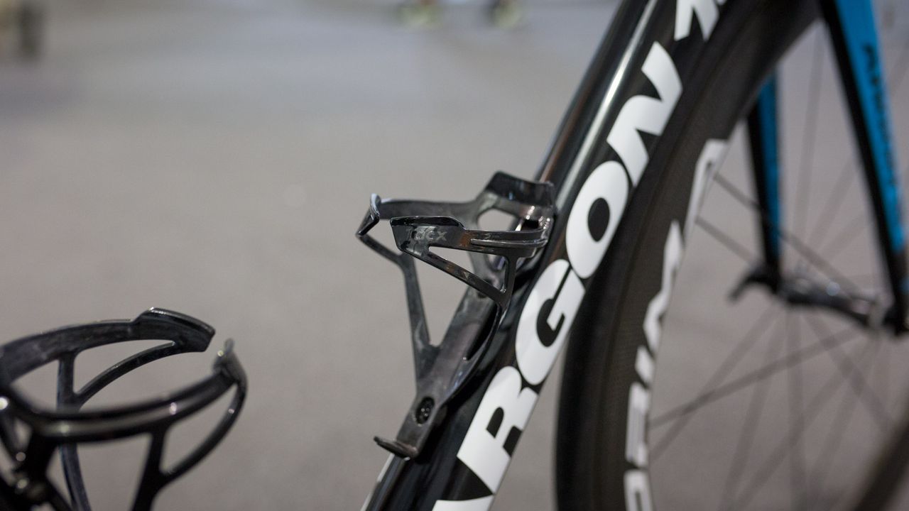 Subtle, black Tacx Deva bottle cages for the Astana team