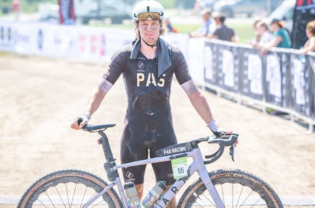 Simen Nordahl Svendsen stands at the finish line in Lincoln, Nebraska as men's winner of Gravel Worlds 2024