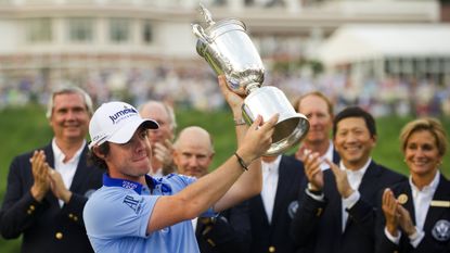 Rory McIlroy celebrates with the trophy after winning the 2011 US Open
