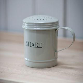 vintage style shaker on wooden table