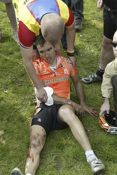 One of the Euskaltel riders stunned with pain after crashing on the descent of the Kemmel